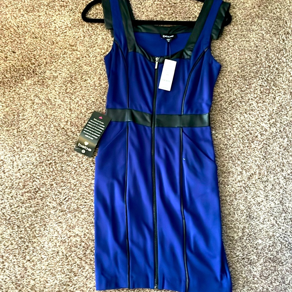 Brand new BEBE black and blue mini dress with leather accents